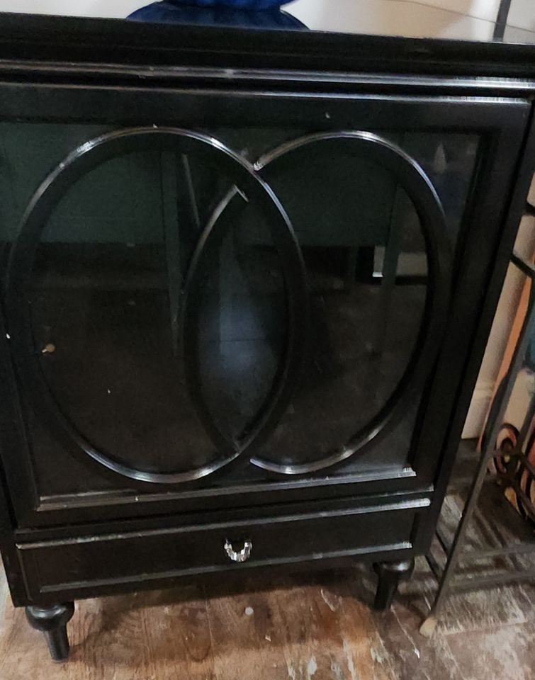 Modern designer deco-style black lacquer cabinet w/ pop-open glass door & bottom drawer. 24w x 18.5 - 7