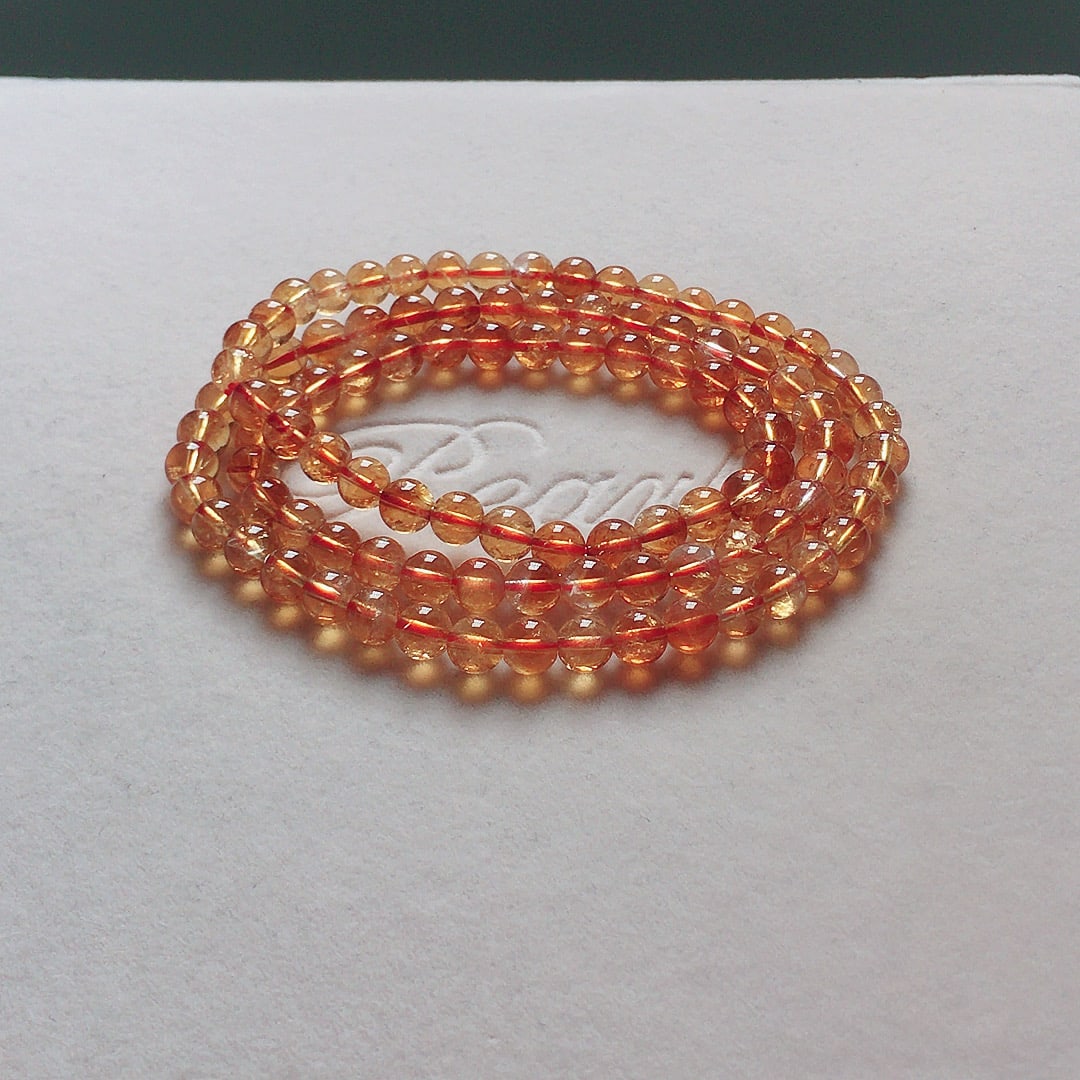 Natural Yellow Quartz Multi-strand Bracelet: Title: Natural Yellow Quartz Multi-strand Bracelet Description: Natural Yellow Crystal Multi-layer Bracelet! Color yellow! Crystal clear! Specification 5.8mm weight 26 grams Reserve: $300.00 Shipping: