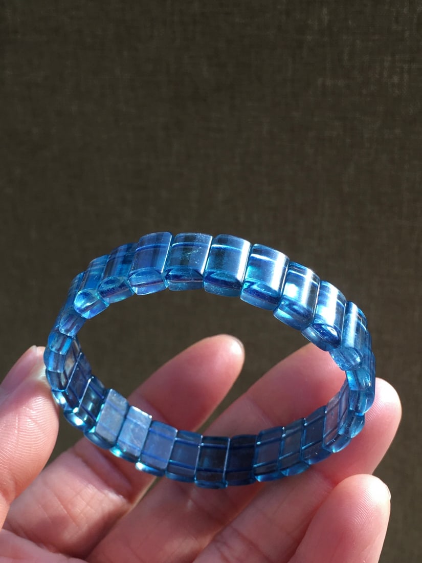 Aquamarine Strand Bracelet: Title: Aquamarine Strand Bracelet Description: Aquamarine beaded bracelet, specifications 11.9x4.5 mmWeight 17.8 grams, crystal clear, devil's blue Reserve: $400.00 Shipping:Domestic: Shipping