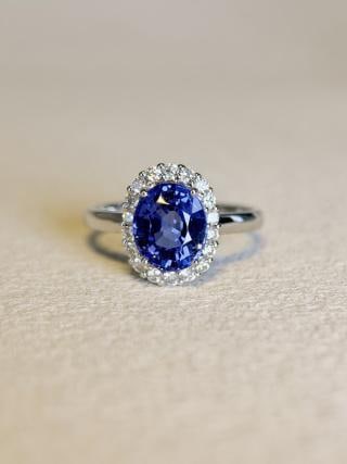 18k White Gold Tanzanite Ring: Title: 18k White Gold Tanzanite Ring Description: Tanzanite Ring Classic Paved Style, Oval Main Stone Total 2.325ct, All Clean Full Fire, 18k White Gold, Weight 3.158g, Natural Diamonds 0.296ct, Size