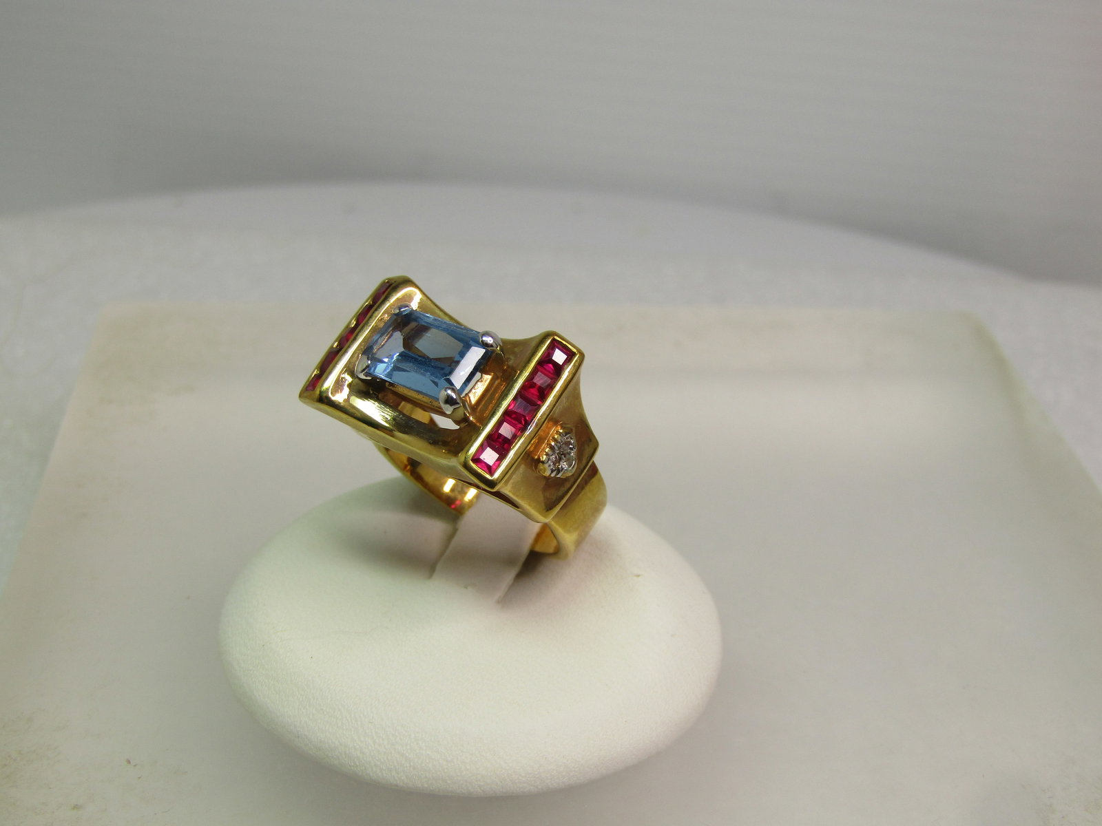 Vintage Sterling Vermeil Ruby/Sapphire Ring, Farrah Fawcett Signed, 1990's, Sz. 6.75. Statement: Vintage Sterling Vermeil Ruby/Blue Topaz Ring, Farrah Fawcett Signed, 1990's, Sz. 6.75. Marked .925, sterling with 14kt vermeil finish. Quite the statement ring. This has a blue stone that tests as bl