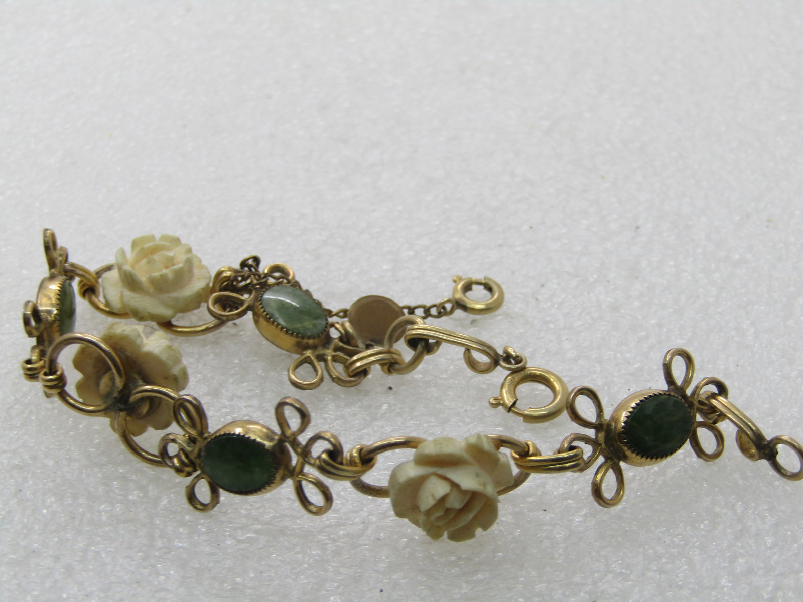 Vintage D'or Faux Carved Rose Bracelet with Green Stones, 7.5" - scrolled accent on each side of the - 5