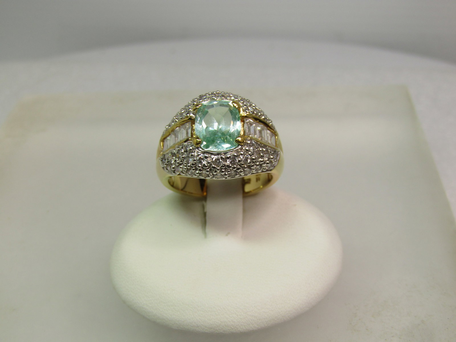 Vermeil Blue Topaz CZ Wide Ring, Sz. 7, Signed MRF, Marked .925: Vermeil Blue Topaz CZ Wide Ring, Sz. 7, Signed MRF, Marked .925. These rings were sold on Home Shopping Network at the end of the 1990's. Two tone with the ring being both gold finish and silver. The