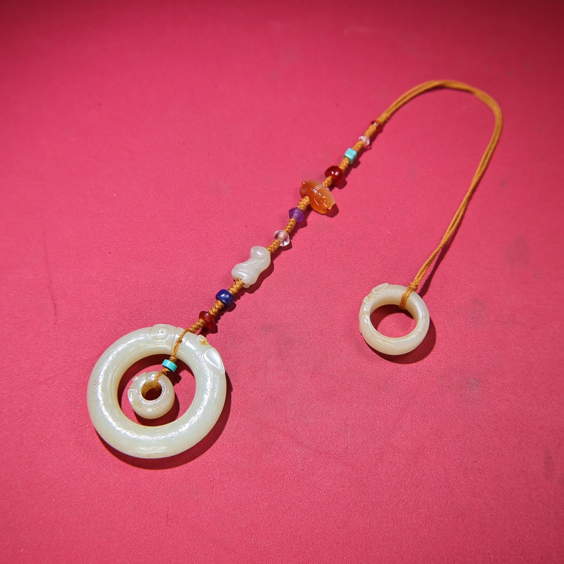 Superb Chinese Hetian Jade,lapis lazuli,agate,crystal Pendant: Title: Superb Chinese Hetian Jade,lapis lazuli,agate,crystal Pendant Origin: Chinese Date/Period: After1850 Materials: Hetian Jade,lapis lazuli,agate,crystal Dimensions: 56x12(mm) 2.20x0.47(inches) We