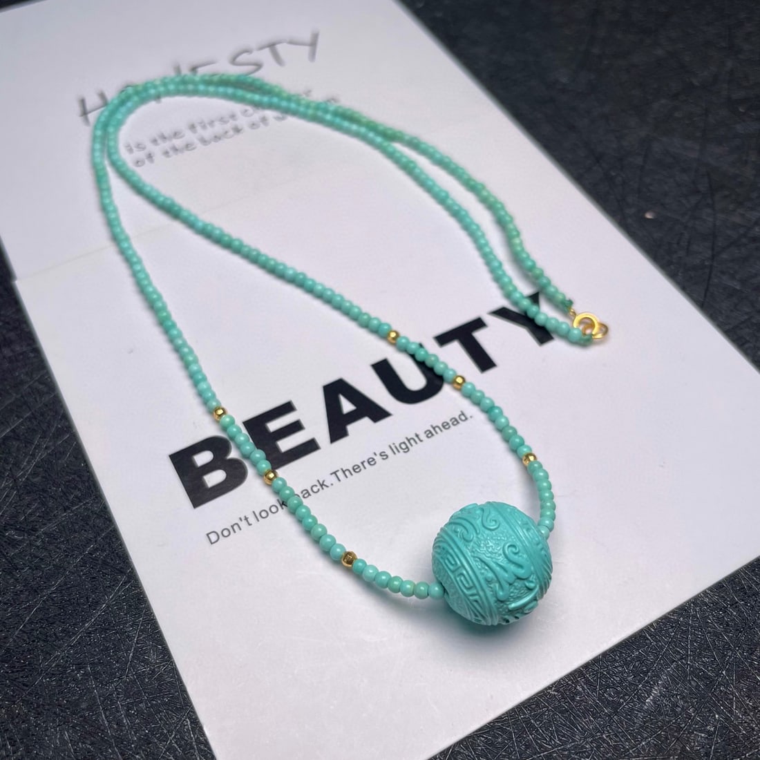 High Quality Natural Turquoise Carved Lucky Bead Pendant: Title: High Quality Natural Turquoise Carved Lucky Bead Pendant Origin: Chinese Date/Period: After2020 Materials: Turquoise Dimensions: 14 x 13 (mm) 0.55 x 0.51 (inches)Dimension: 2.1 (mm) 0.08