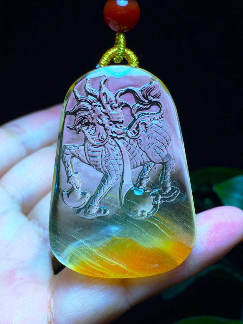 Beautiful Crystal Carved Fortune Kylin Pendant: Title: Beautiful Crystal Carved Fortune Kylin Pendant Origin: Chinese Date/Period: After2020 Materials: Crystal Dimensions: 47 x 33 x 12 (mm)1.85 x 1.30 x 0.47 (inches) Weight: 0.07 lbs/ 30.6 g Reserv