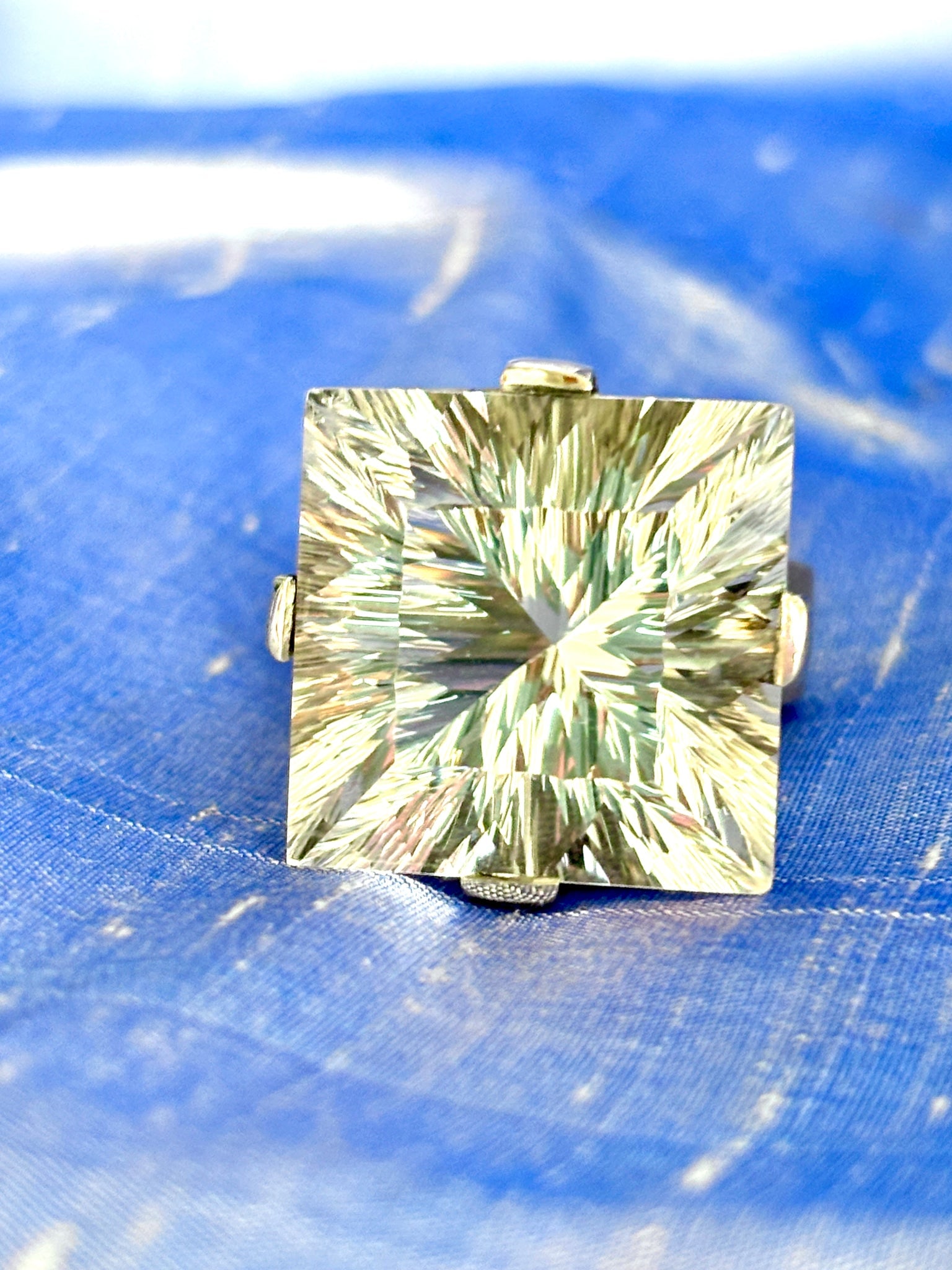 Cocktail Ring with Large Rock Crystal: Title:Cocktail Ring with Large Rock Crystal Description:Hundreds of facets in this rock! Wow is it showy and fun. Looks like a Mondo Diamond set in platinum. Actually, it is brushed Sterling Silver, b