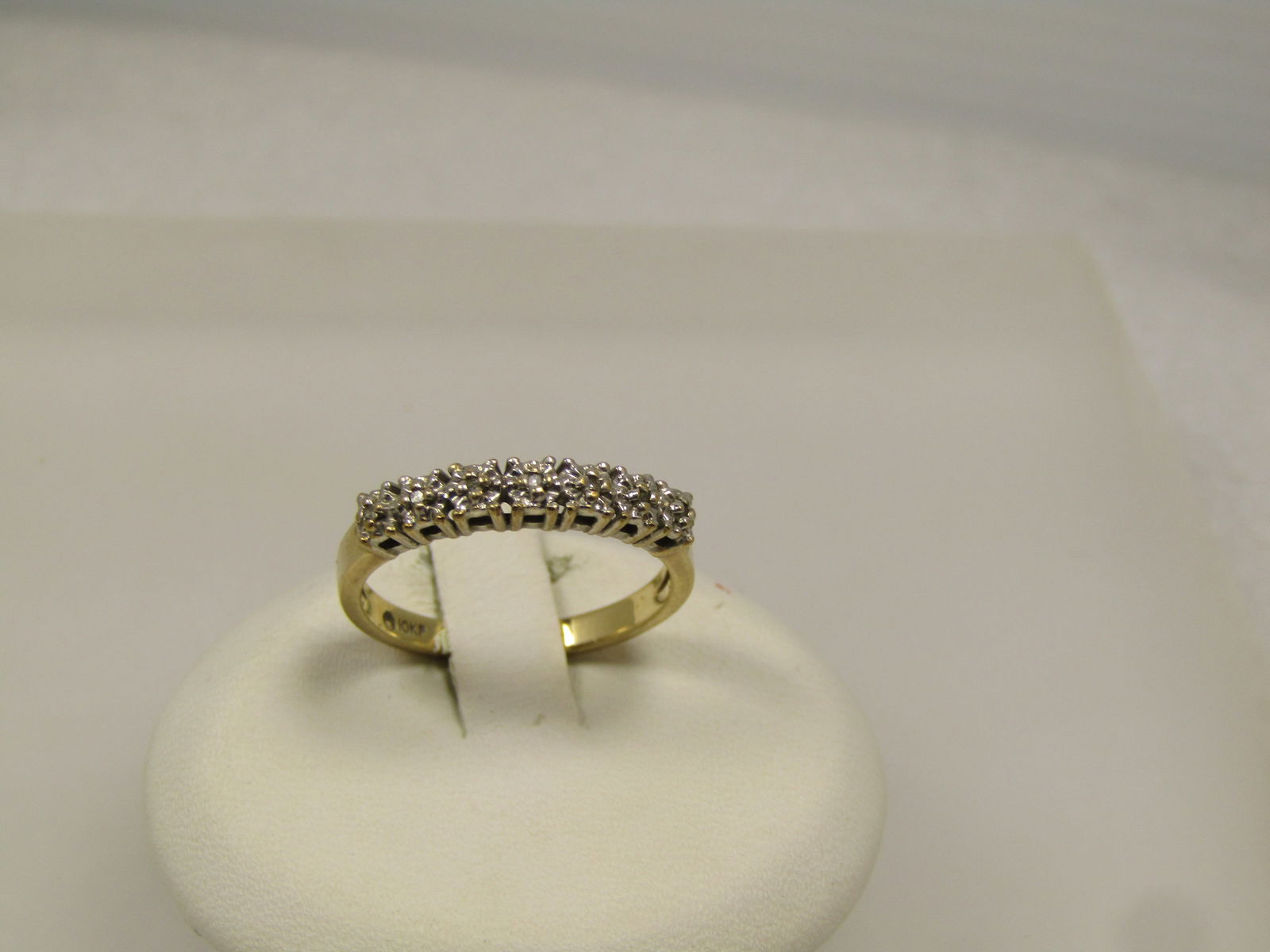 Vintage 10kt Diamond Band Ring, Sz. 7, 1960's-1970's. Signed: Title:Vintage 10kt Diamond Band Ring, Sz. 7, 1960's-1970's. Signed Description:Vintage 10kt Diamond Band Ring, Sz. 7, 1960's-1970's, possibly mid-century. Signed with an unknown maker's marked. Marked