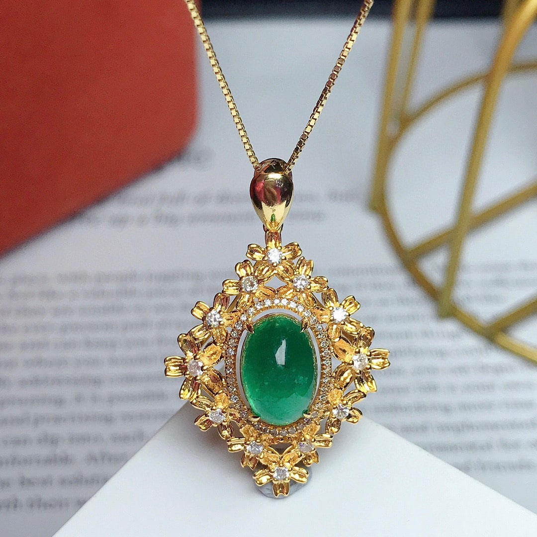 14K GOLD 2.80 CT VIVID GREEN NATURAL EMERALD & DIAMOND PENDANT: Title:14K GOLD 2.80 CT VIVID GREEN NATURAL EMERALD & DIAMOND PENDANTDescription:Ref:230528225Gold Content:14K GoldMain Gemstone:EmeraldNumber of stones:1Shape:OvalCarat Weight:2.80ct Color:Vivid