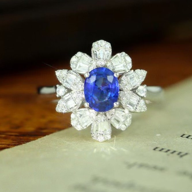 14K GOLD 1.38 CTW NATURAL SAPPHIRE & DIAMOND RING: Title:14K GOLD 1.38 CTW NATURAL SAPPHIRE & DIAMOND RINGDescription:Ref:230528234Gold Content:14K GoldRing Size:7.25USMain Gemstone:SapphireNumber of stones:1Shape:OvalCarat Weight:0.98ct