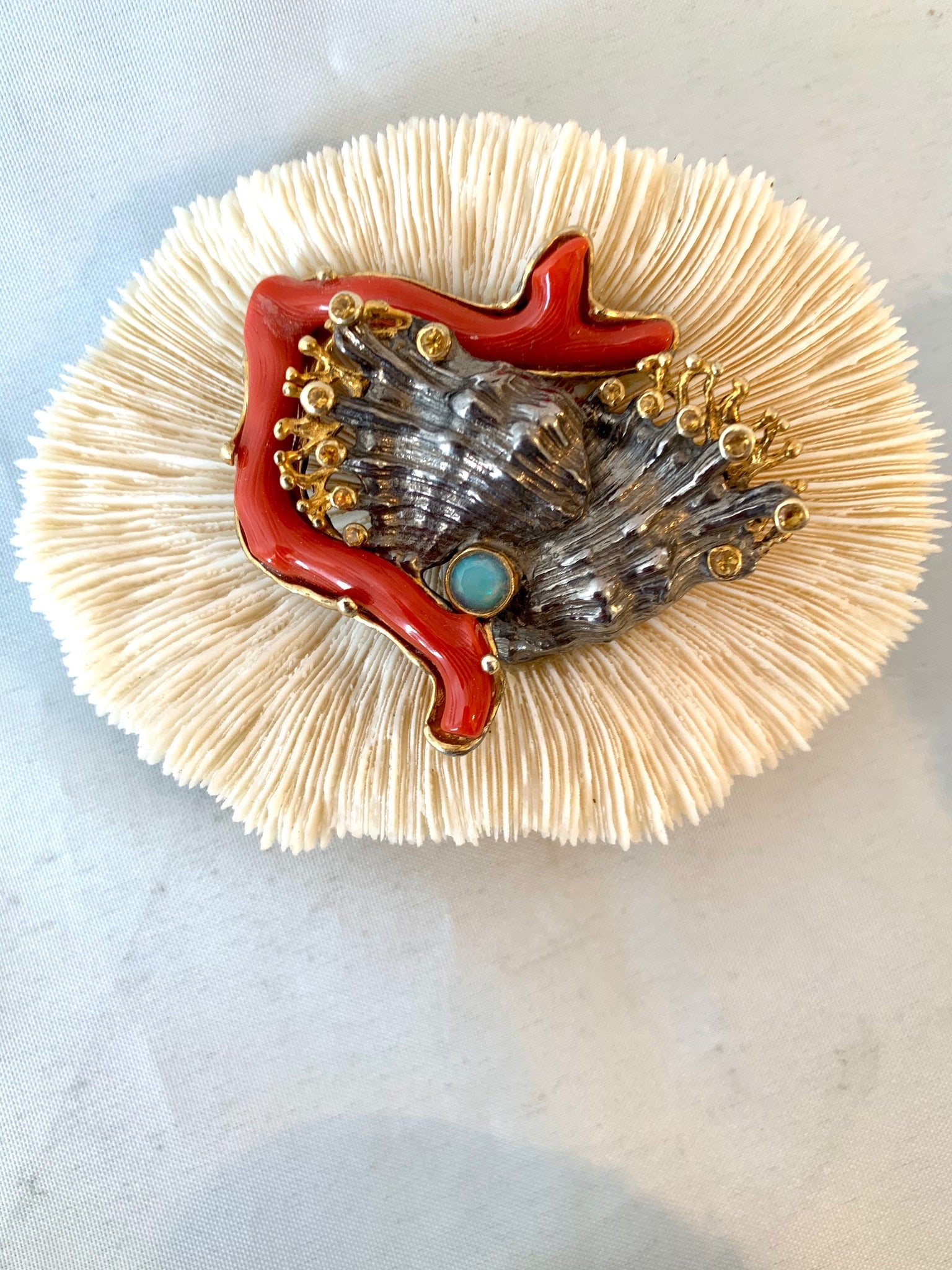 Silver & Gold, Gemstone Coral Brooch: Title:Silver & Gold, Gemstone Coral BroochDescription:Intricate oxidized sterling sea creature with gold tips embedded with Citrine. Opals and Italian Red Coral Branch brooch. 3” H. Reserve: