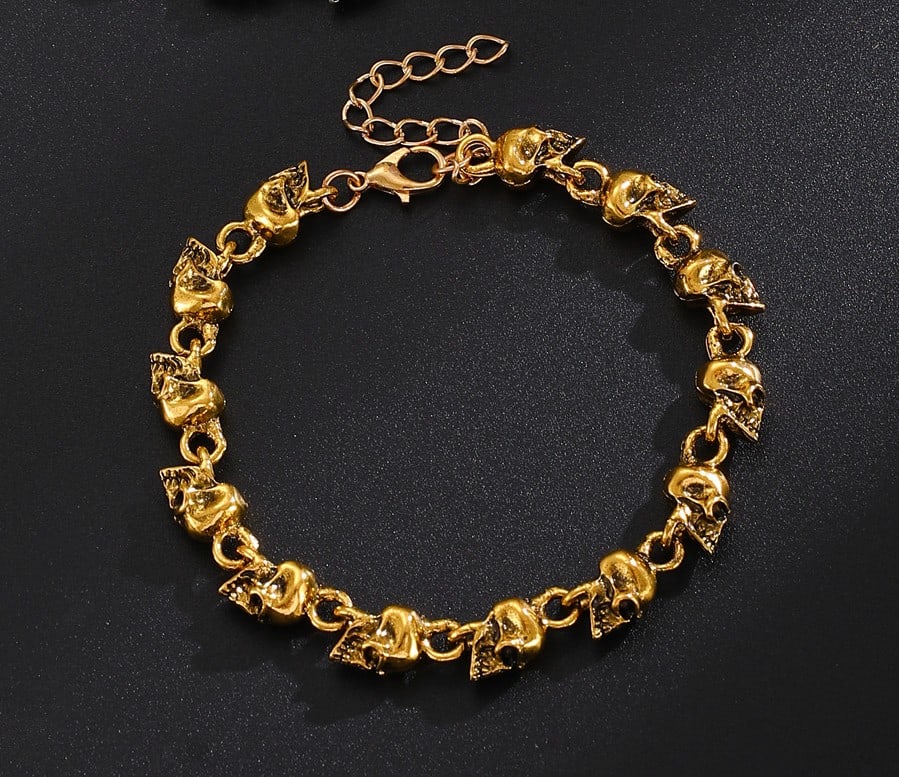 Gold-Plated Titanium Steel Skull Bracelet – 13 Skull Beads, Gothic Punk Jewelry: Title:Gold-Plated Titanium Steel Skull Bracelet – 13 Skull Beads, Gothic Punk JewelryDescription:Elevate your style with this gold-plated titanium steel skull bracelet. Featuring 13 detailed