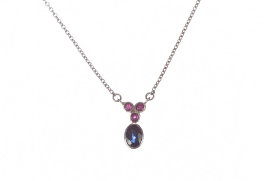 Sterling Silver Blue Sapphire and Ruby Necklace Alberto Juan: Title:Sterling Silver Blue Sapphire and Ruby Necklace Alberto JuanDescription:Necklace measures 16” to 18” long and is adjustable. Pendant measures 15 mm’s by 7 mm’s. Blue
