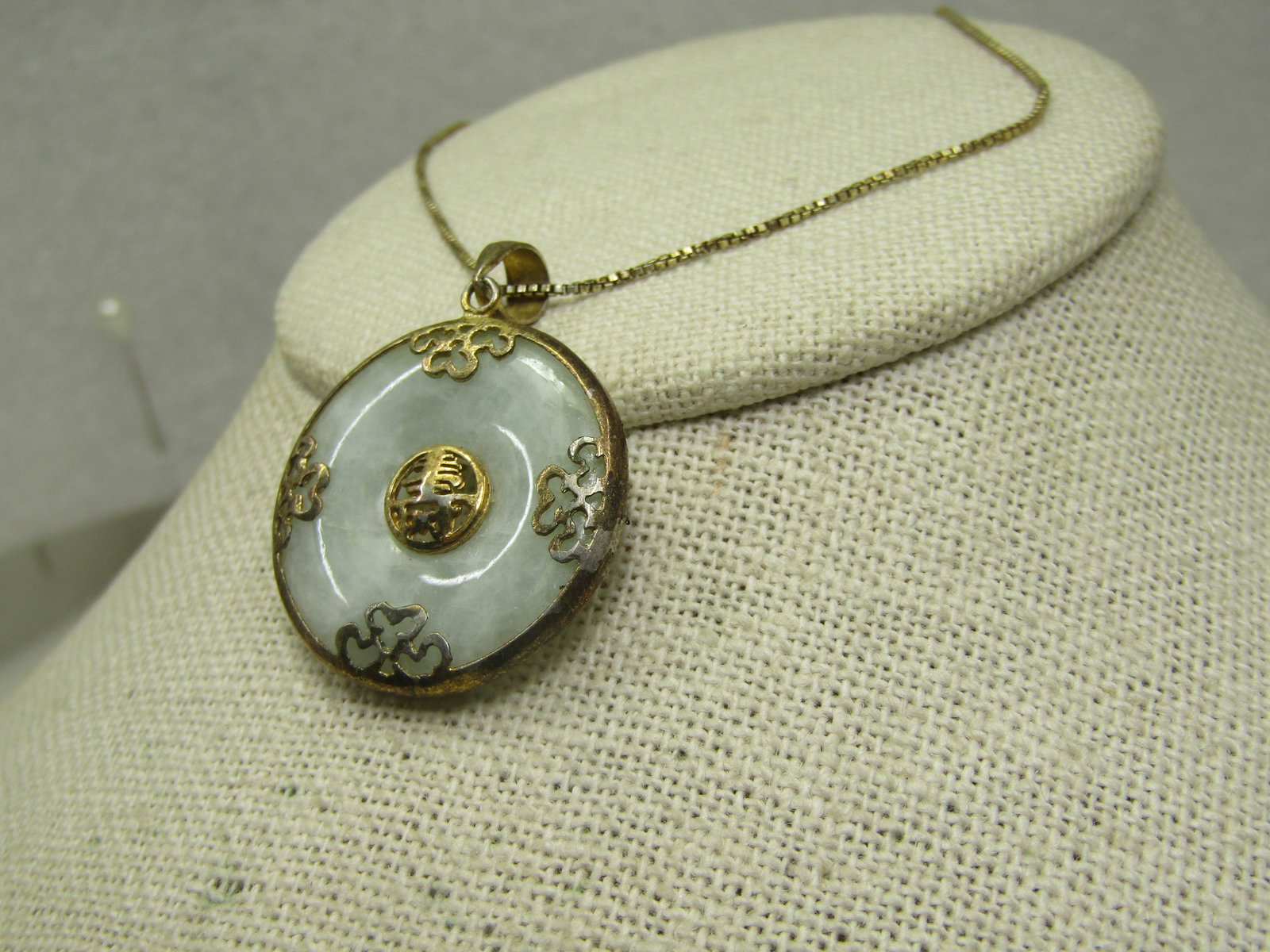 Vintage Sterling Jade Necklace, Gold Over, Filigree Bezel, 18" Signed A: Vintage Sterling Jade Necklace, Gold Over, Filigree Bezel, 18" Signed A and marked .925 on the pendant and also on the chain with the addition of Italy. This has a center symbol with a solid bezel
