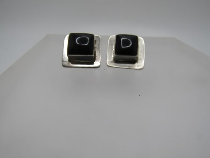 Vintage Sterling Onyx Earrings, Pierced, Mexican, 1970's-1980's, Signed: DescriptionVintage Sterling Onyx Earrings, Pierced, Mexican, 1970's-1980's, Signed T8-152, marked Mexico and sterling. Tested and test as sterling with a weightof appx. 8.57 gr. They have a raised bez