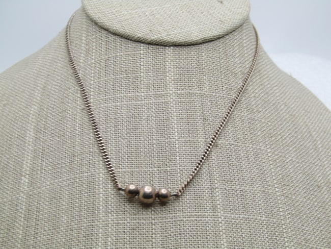 Vintage Sterling Silver Triple Beaded Necklace, 14.5", 1960's-1970's.: Vintage Sterling Silver Triple Beaded Necklace, 14.5", 1960's-1970's. The beads are connected and the smaller ones are appx. 4.5mm and the center is appx. 6.5mm. The chain is a curb link chain that is