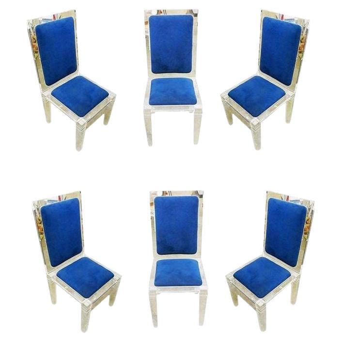 Midcentury Lucite Skyscraper Style Dining Chairs, Set of Six: Title: Midcentury Lucite Skyscraper Style Dining Chairs, Set of Six Description: This handsome dining set features six hand-sculpted clear lucite side chairs. The six chairs are rendered in thick Luci
