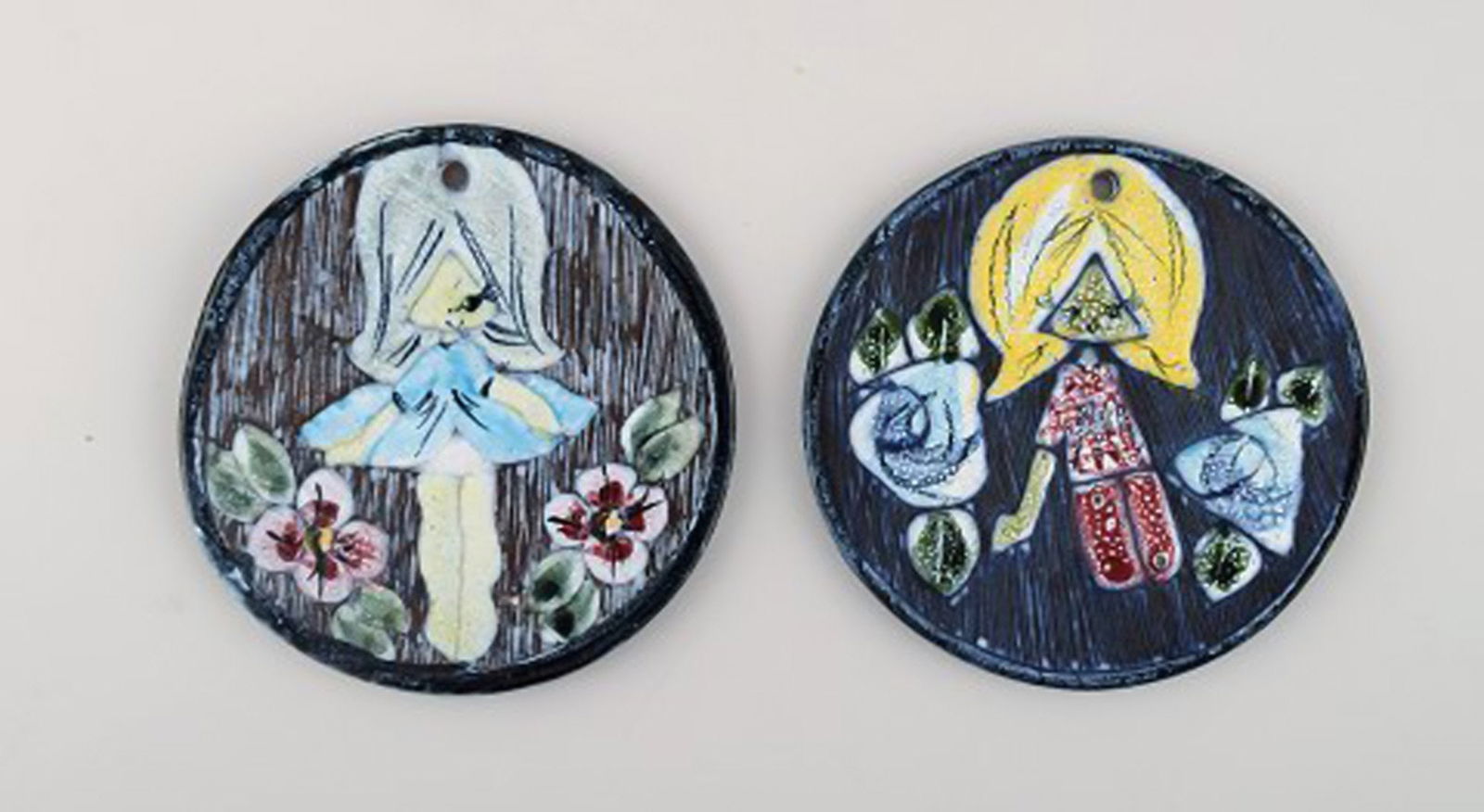 Tilgmans, Sweden. A collection of glazed ceramics decorated with girls and floral motifs. 1960s. - 2