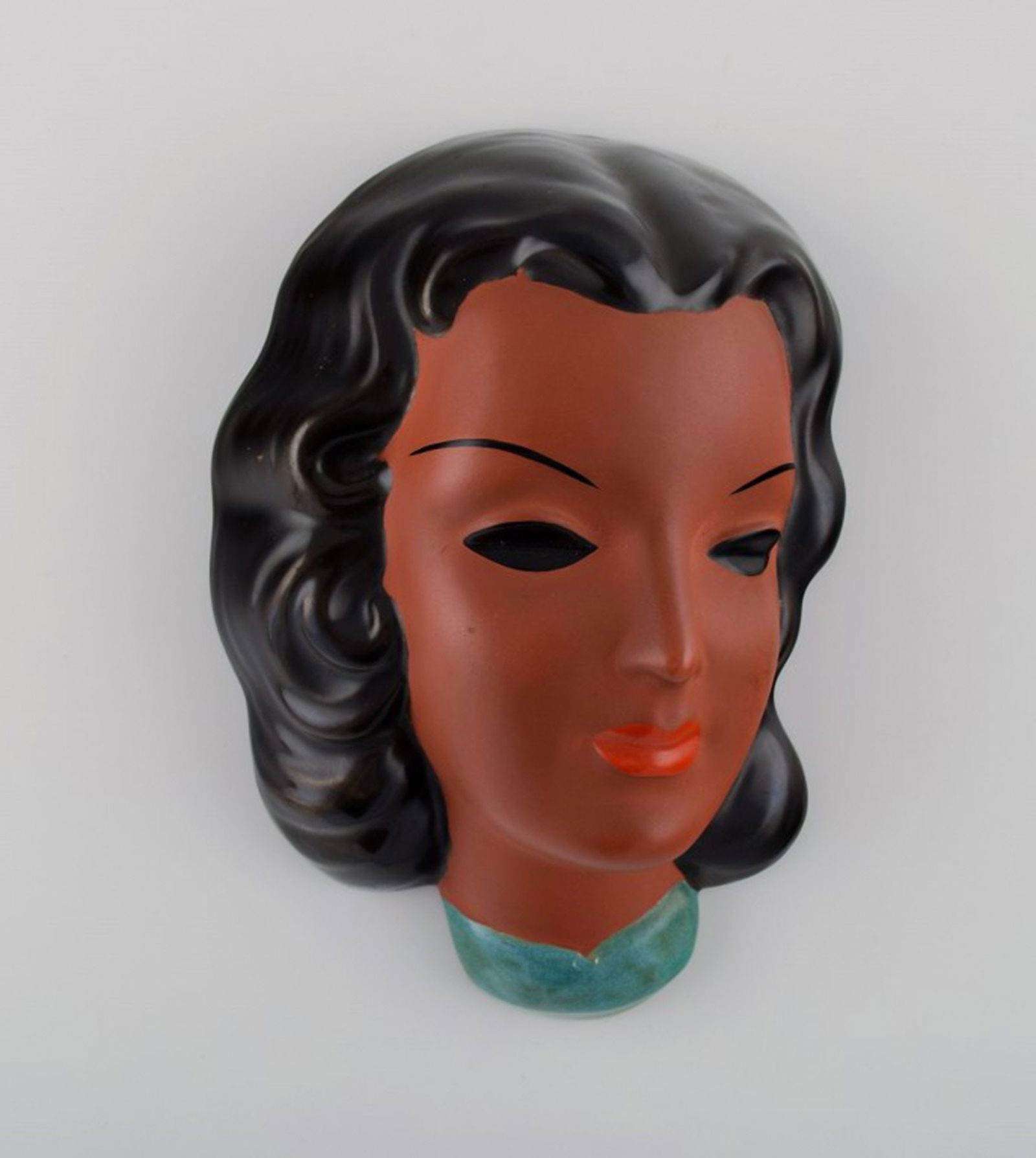 Goldscheider, Austria. Art deco female face in handpainted glazed ceramics. Dated 1953. (1 of 5)