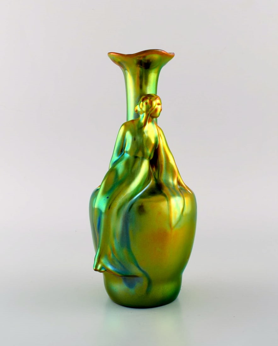 Zsolnay art nouveau vase in glazed ceramics modeled with sitting woman. Beautiful luster glaze.: Title: Zsolnay art nouveau vase in glazed ceramics modeled with sitting woman. Beautiful luster glaze. 1920/30's. Description: Zsolnay art nouveau vase in glazed ceramics modeled with sitting woman. B