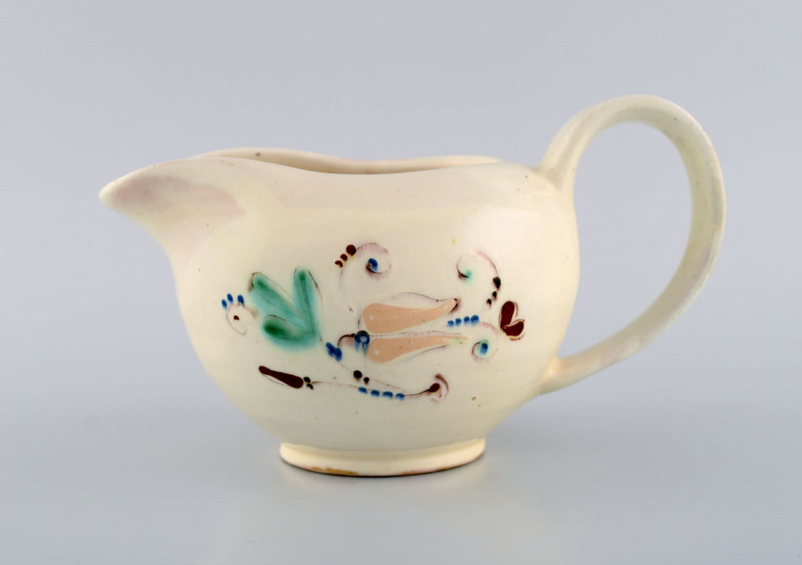 Kähler, Denmark. Jug in glazed ceramics. Flowers on cream colored background. Modern design, (1 of 5)