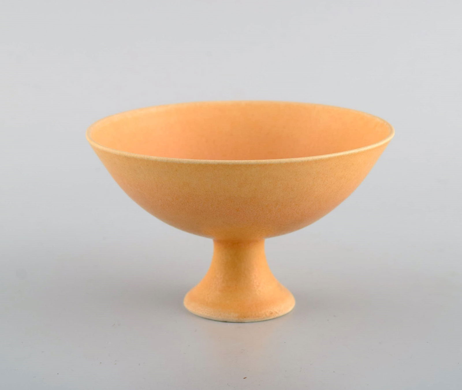 European studio ceramicist. Unique bowl on base in glazed ceramics. Beautiful glaze in light yellow (1 of 6)