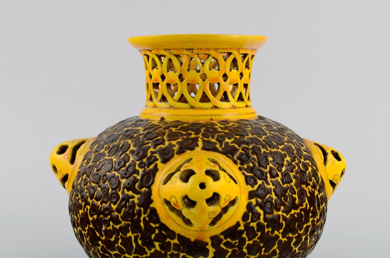 Antique Zsolnay vase in openwork glazed ceramics. Beautiful glaze in yellow and brown shades. Dated - 5