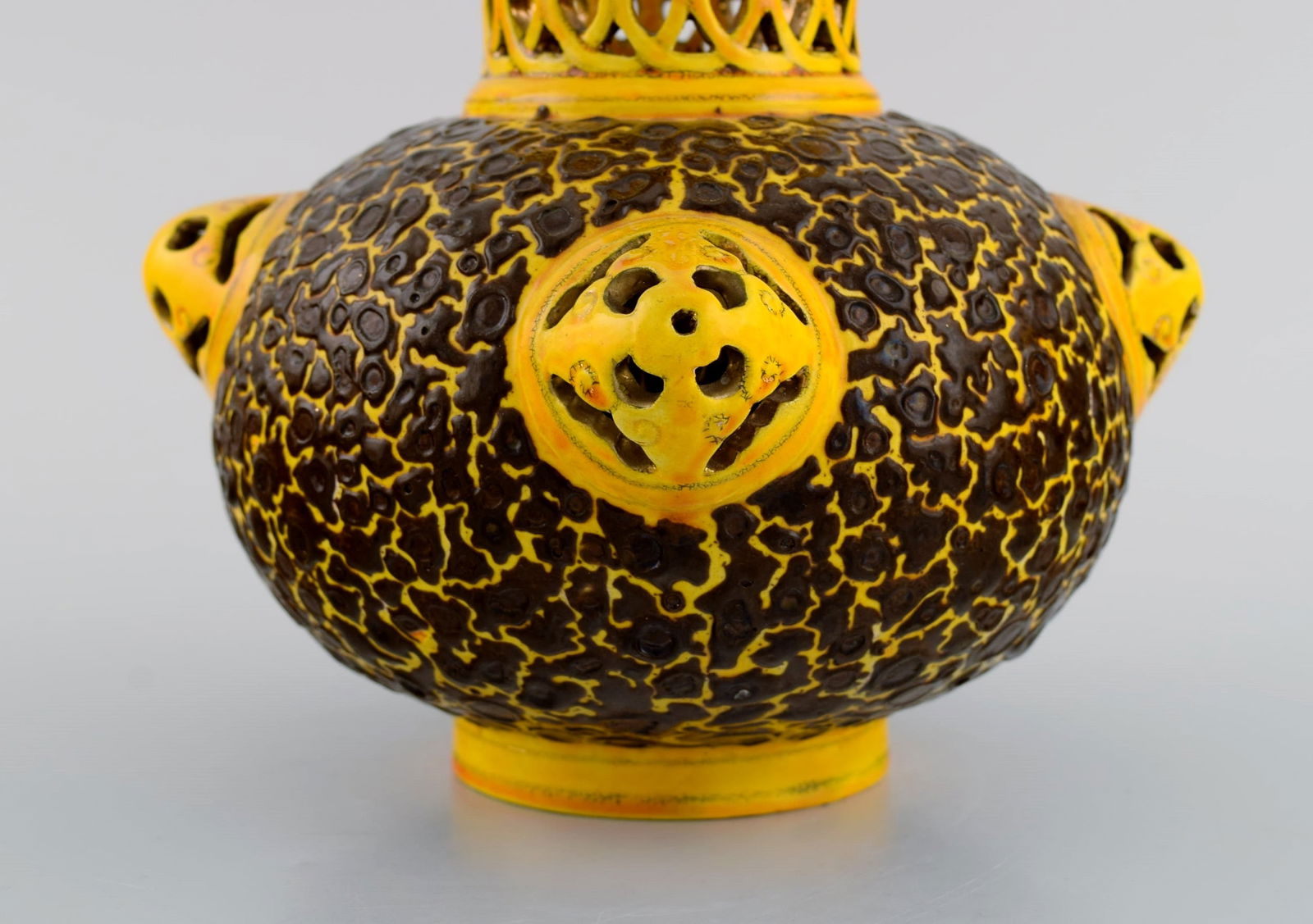 Antique Zsolnay vase in openwork glazed ceramics. Beautiful glaze in yellow and brown shades. Dated - 6
