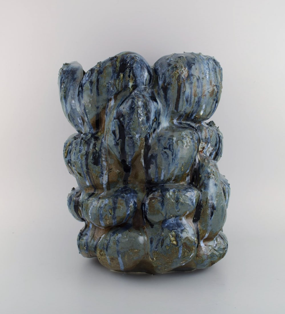 Christina Muff, Danish contemporary ceramicist (b. 1971). Large, hand modeled stoneware sculptural: Title: Christina Muff, Danish contemporary ceramicist (b. 1971). Large, hand modeled stoneware sculptural vase with protrusions. This vessel is glazed in hues of grey and blue with brown areas in the