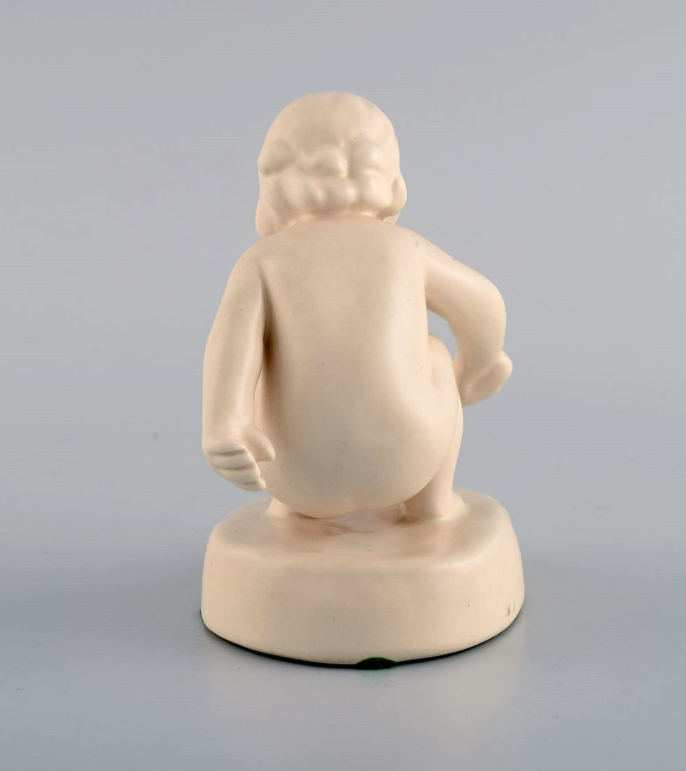 Adda Bonfils (1883-1943) for Ipsens Enke. Figure of girl with shovel in glazed ceramics. Model - 4