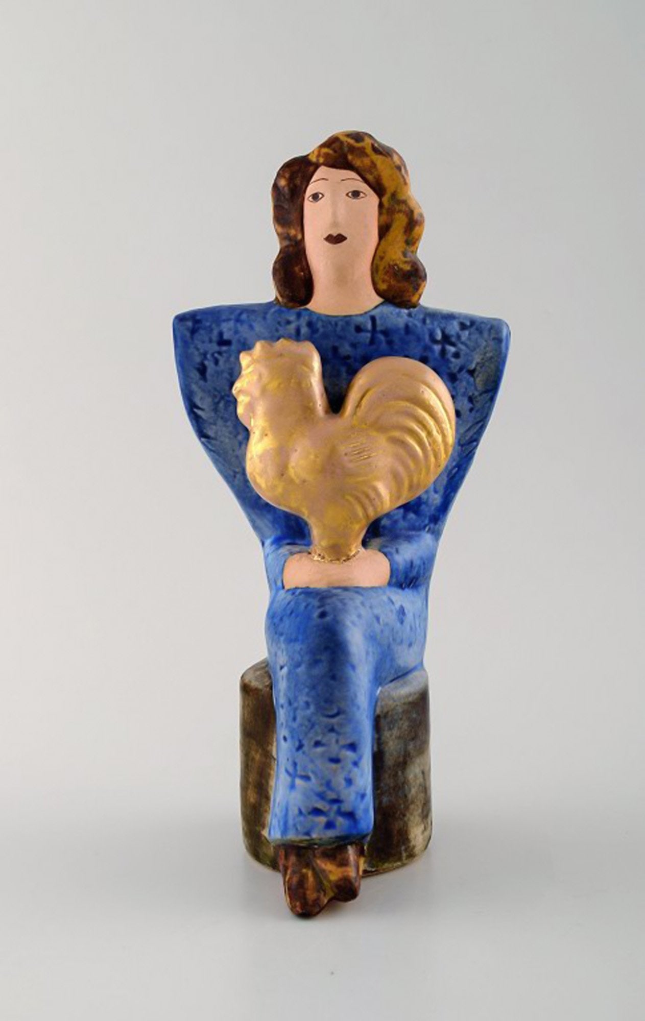 Very rare Lisa Larson unique figure of sitting woman in blue with golden rooster.: Title: Very rare Lisa Larson unique figure of sitting woman in blue with golden rooster. Description: Very rare Lisa Larson unique figure of sitting woman in blue with golden rooster. Signed.