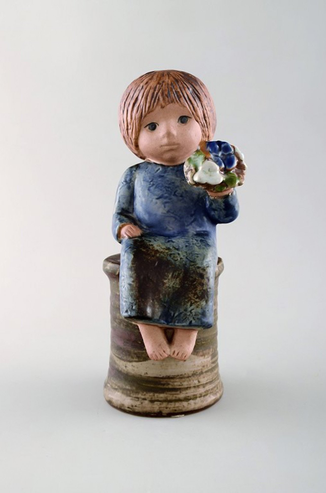 Lisa Larson for Gustavsberg. Girl with flowers in glazed ceramics. 20th century. (1 of 7)