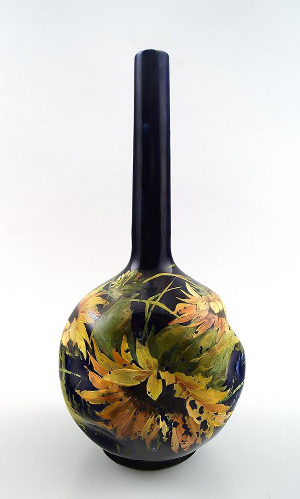Art nouveau Rörstrand narrow-neck vase in earthenware decorated with flowers.: Title: Art nouveau Rörstrand narrow-neck vase in earthenware decorated with flowers. Description: Art nouveau Rörstrand narrow-neck vase in earthenware decorated with flowers. 28 cm. high. I