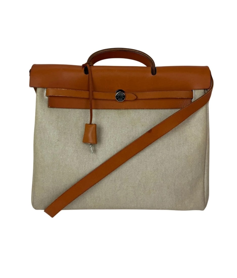 Hermes Toile Vache Herbag 39 MM Natural Shoulder Hand Bag: Title: Hermes Toile Vache Herbag 39 MM Natural Shoulder Hand Bag Description: Pre-Owned 100% Authentic Hermes Toile Vache Herbag 39 MM Natural Shoulder Hand Bag RATING: B-... Good, well maintained, sh