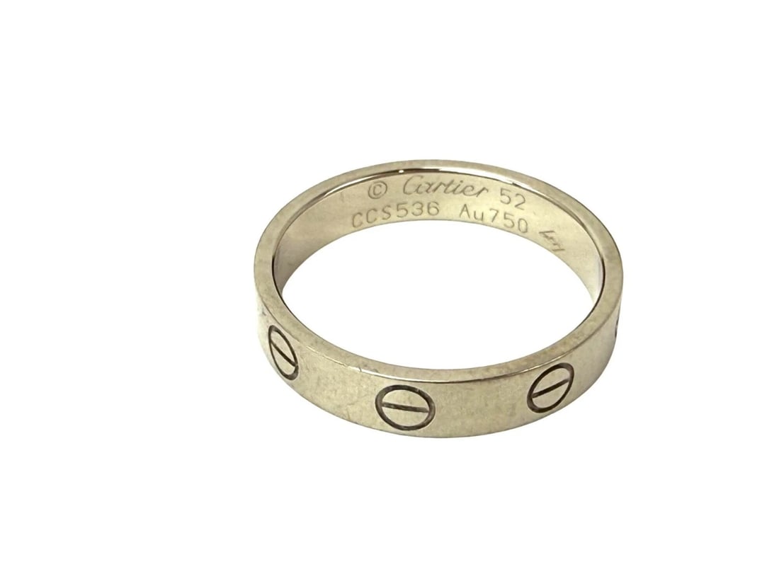 Cartier 18 K White Gold Love Small Model Wedding Band Ring US: 6 European: 52: Title: Cartier 18 K White Gold Love Small Model Wedding Band Ring US: 6 European: 52 Description: This Cartier Ring is hard to photograph. Please note the coloring is even throughout, it was hard to