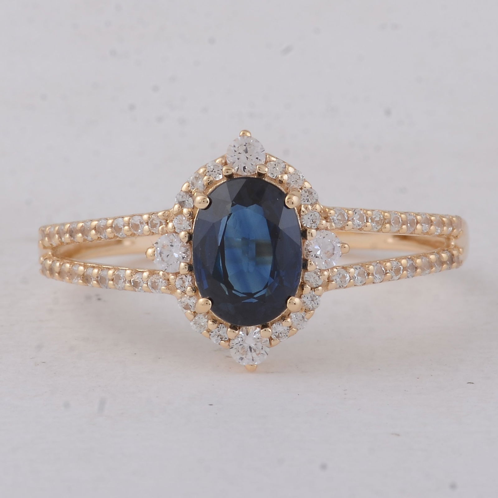 1.44 Ct Oval Sapphire 9K Gold Ring: 1.44 Total Carat Sapphire 9K Gold Ring Specifications - Total Weight 1.89 g - Center Gemstone Sapphire - Gemstone Carat Weight 1.11 Carats - Gemstone Measurements 6.90X5.10X3.3 mm - Additional