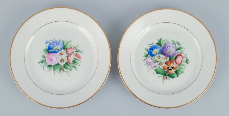 Bing & Grondahl, a set of fourteen plates hand-painted with various polychrome flower motifs and - 4