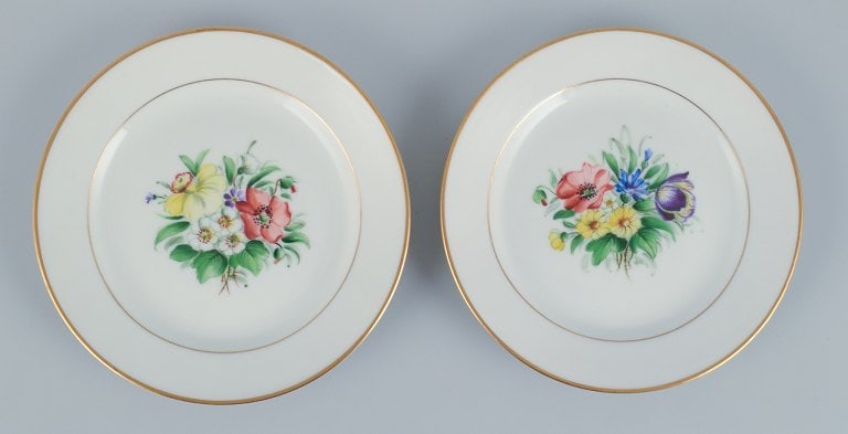 Bing & Grondahl, a set of fourteen plates hand-painted with various polychrome flower motifs and - 8