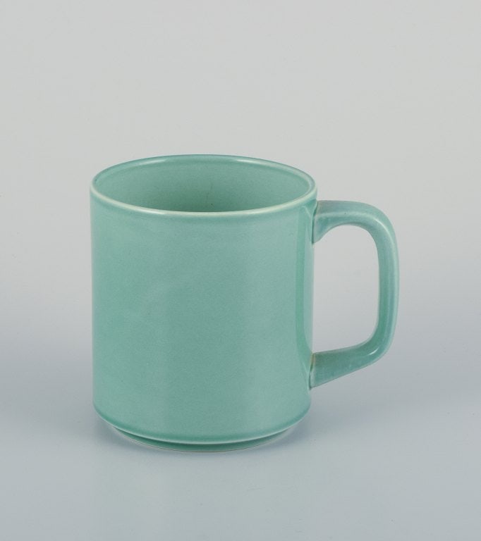 Royal Copenhagen, 4 All Seasons, four coffee mugs and a small oval dish in faience with green glaze. - 3