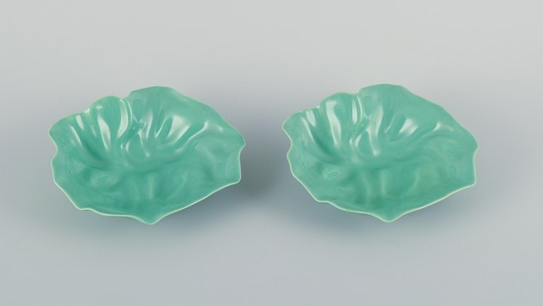 Royal Copenhagen, "4 All Seasons". Two organic-shaped bowls in faience with green glaze. (1 of 4)