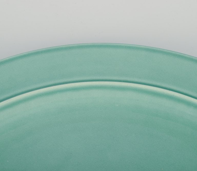 Royal Copenhagen, "4 All Seasons". A set of three dinner plates in faience with green glaze. - 3