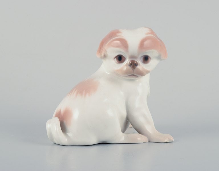 Dahl Jensen for Bing & Grøndahl, porcelain figurine of a Pekingese puppy. (1 of 5)