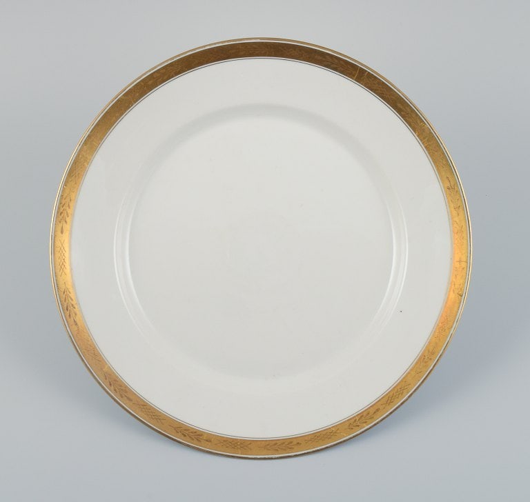 Royal Copenhagen no. 607. Round serving dish in porcelain. Gold border with foliage. (1 of 6)