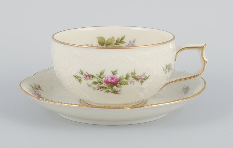 Rosenthal, Germany. "Sanssouci", four cream colored teacups with saucers decorated with flowers and - 3