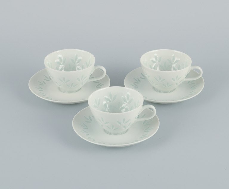 Friedl Holzer-Kjellberg (1905-1993) for Arabia. Three sets of Arabia mocha cups and saucers in rice (1 of 6)