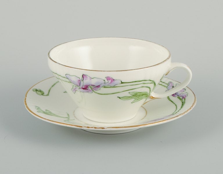 Rörstrand, Sweden. A set of eleven Art Nouveau porcelain teacups with saucers. - 2