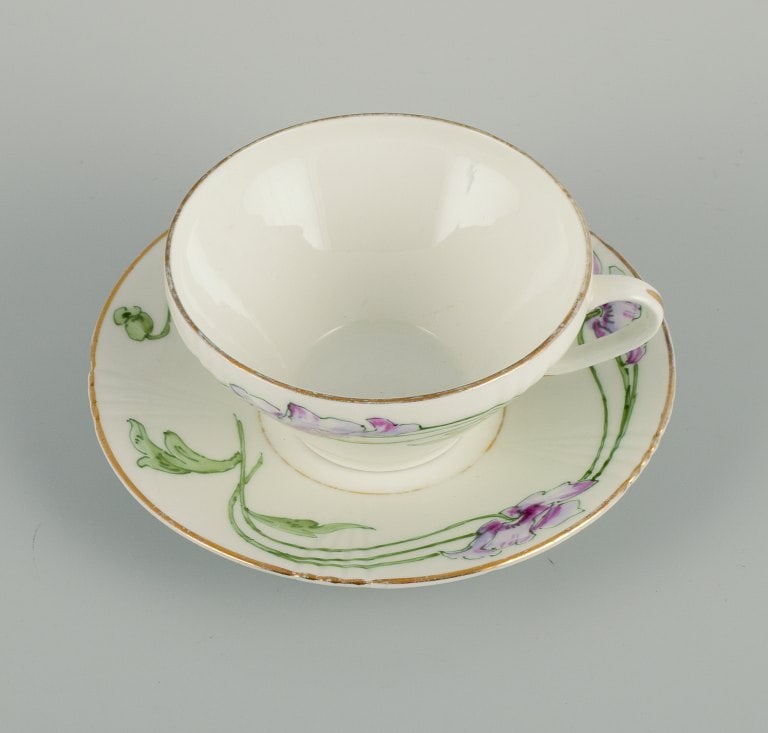 Rörstrand, Sweden. A set of eleven Art Nouveau porcelain teacups with saucers. - 3