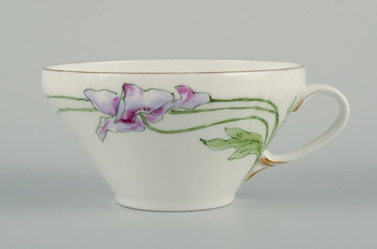 Rörstrand, Sweden. A set of eleven Art Nouveau porcelain teacups with saucers. - 4