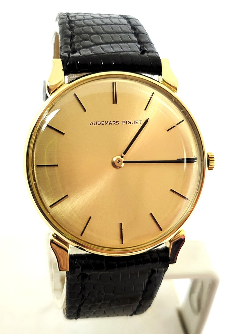 Vintage 18k Gold AUDEMARS PIGUET Men's Automatic Watch Cal K2120 RARE* EXLNT: Vintage 18k Gold AUDEMARS PIGUET Men's Automatic Watch Cal K2120 RARE* EXLNT​ This Men’s Audemars Piguet watch is Swiss made Great present for watch collectors & enthusiasts! Very Rare Col