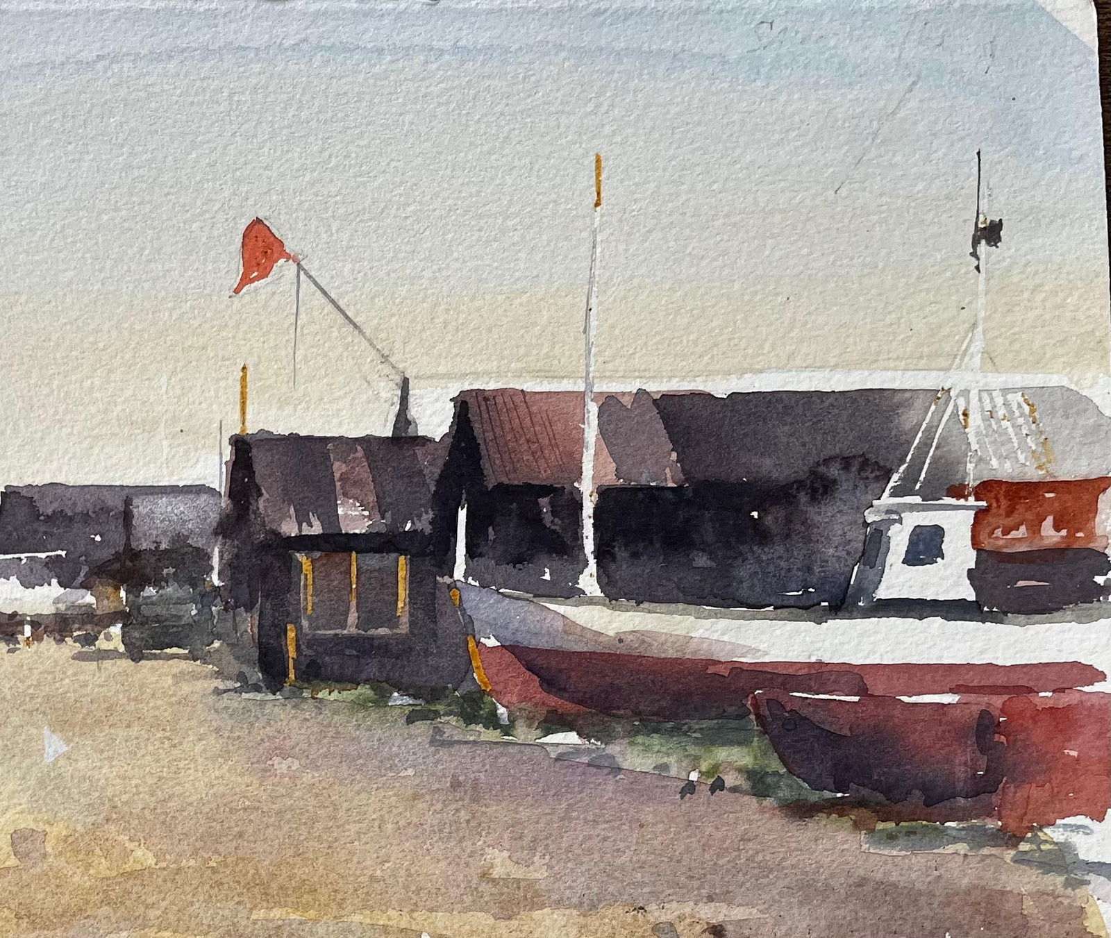 Anthony Herbert; Coastal Boatyard with Fishing Huts Beached Boats and Red Flag Watercolour Scene - 6